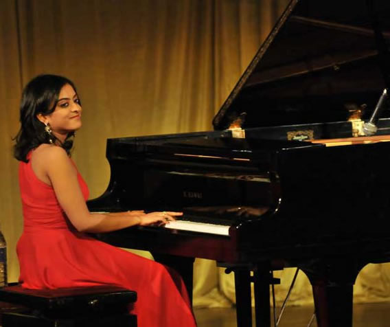 female piano player mysore