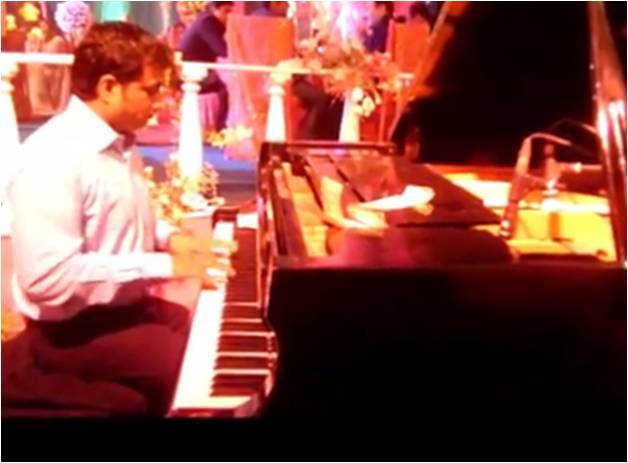 male piano player mysore