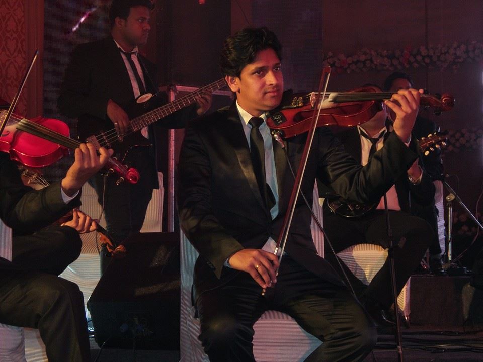 male violin player mysore
